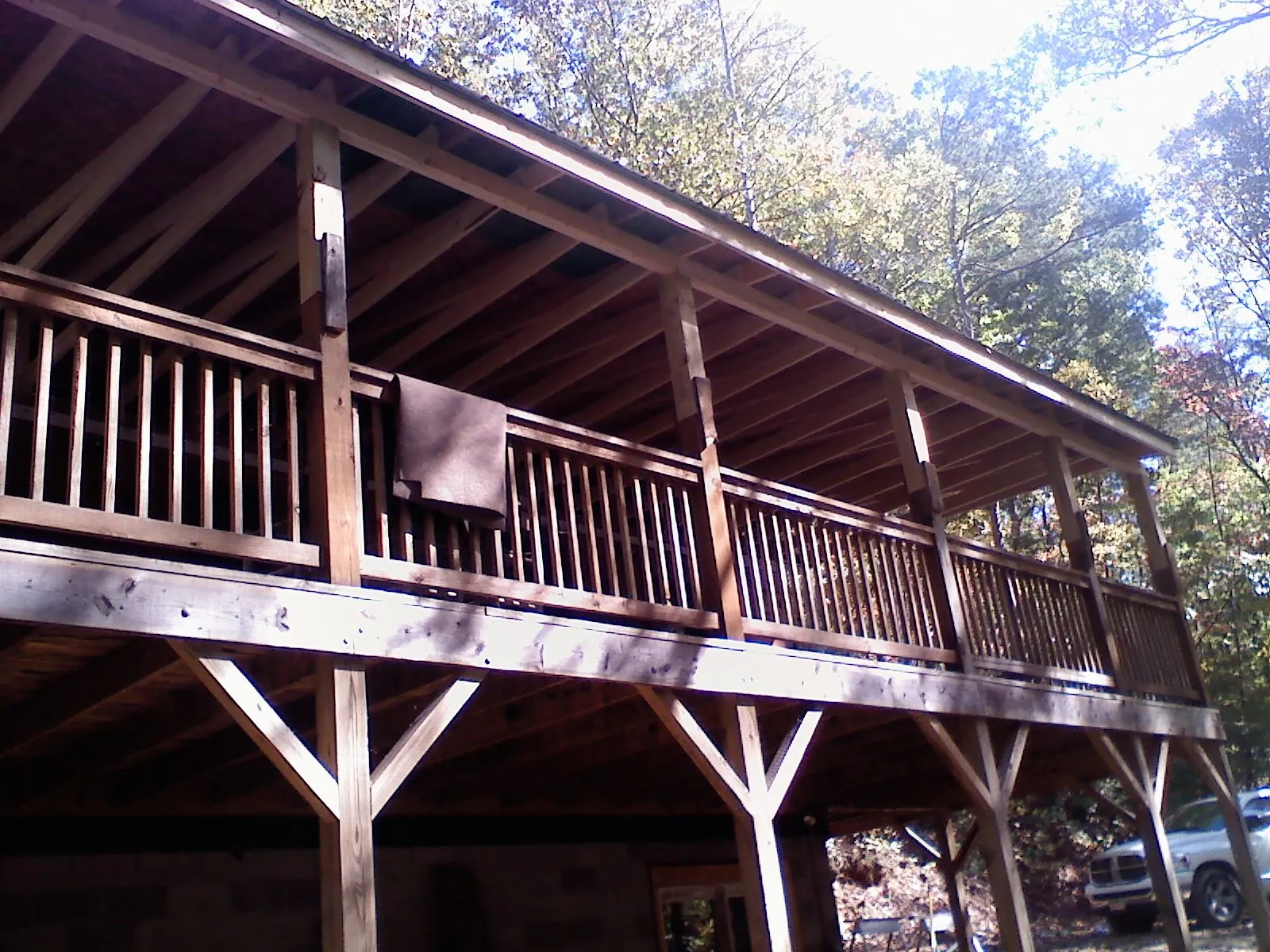 Timber framing under a new elevated porch and deck — Roof Leak Repair in Jefferson Valley by Roofing Brothers